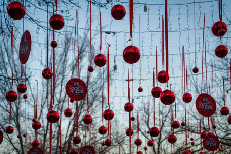 Tashkent, Uzbekistan - December 29, 2022: New Year or Christmas festive balls and garlands hanging in rows on twilight.のeditorial素材
