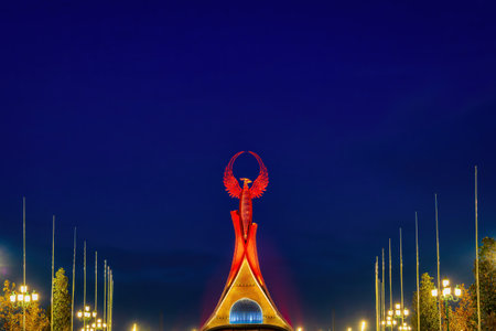 UZBEKISTAN, TASHKENT - JANUARY 4, 2023: Illuminated monument of independence in the form of a stele...