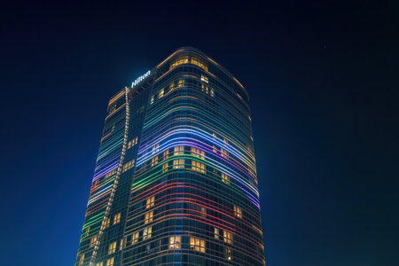 Uzbekistan, Tashkent - December 27, 2022: Hilton hotel building in night illumination on a sky...