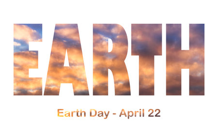 Lettering Earth Day April 22 on the background of sunset cloudy sky. Earth day concept, protection...