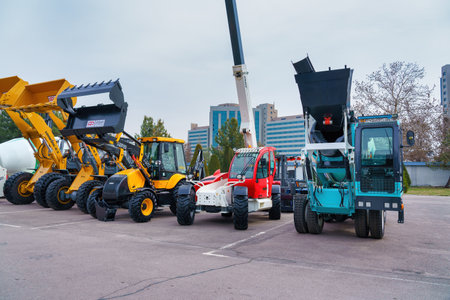 Tashkent, Uzbekistan - March 14, 2023: Various construction equipment at an open-air exhibition.