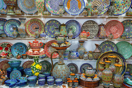 Arabic painted ceramic plates and crockery displayed in the shop.の写真素材