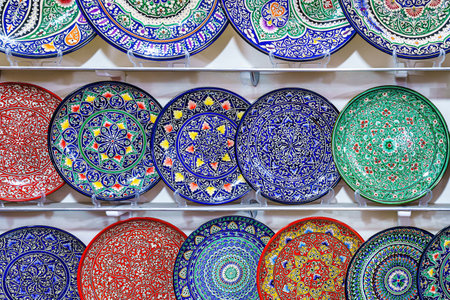 Arabic painted ceramic plates hanging on the wall.の写真素材