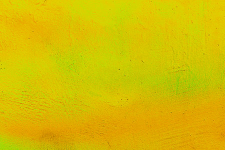 A fragment of colorful graffiti painted on a wall. Abstract urban background for design. spray painting art.の写真素材