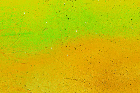 A fragment of colorful graffiti painted on a wall. Abstract urban background for design. spray painting art.の写真素材