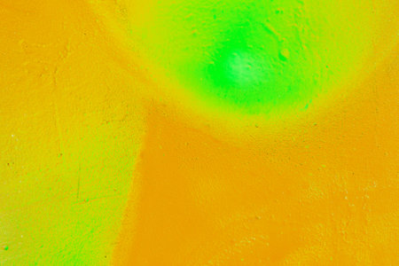 A fragment of colorful graffiti painted on a wall. Abstract urban background for design. spray painting art.の写真素材