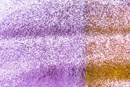 A fragment of colorful graffiti painted on a wall. Abstract urban background for design. spray painting art.の写真素材