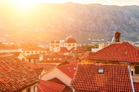 Sunset over the red tiled roofs of the old medieval town of Kotor, Montenegro.の写真素材
