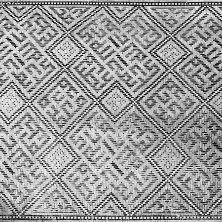 Geometric traditional Islamic ornament. Fragment of a ceramic mosaic.Abstract background. black and...