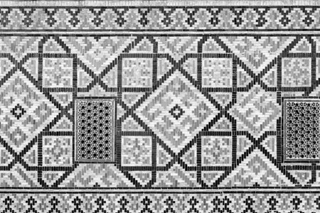 Geometric traditional Islamic ornament. Fragment of a ceramic mosaic.Abstract background. black and white.の写真素材