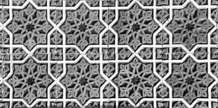 Geometric traditional Islamic ornament. Fragment of a ceramic mosaic.Abstract background. black and white.の写真素材