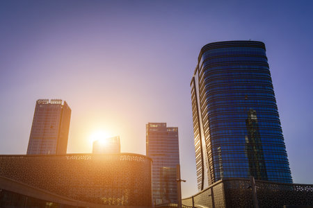 Uzbekistan, Tashkent - September 27, 2023: Building of hotel Hilton and skyscrapers on a sunset in Tashkent city district.のeditorial素材