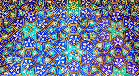 Geometric traditional Islamic ornament. Fragment of a ceramic mosaic.Abstract background.