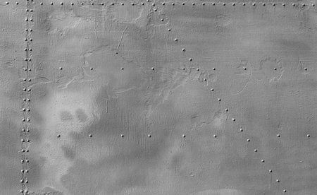 Texture of old metal, painted gray with rivets. Abstract background for design.