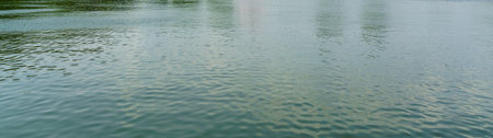 The texture of ripples on the water. Abstract natural background.