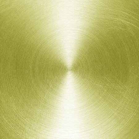 Golden circular brushed shiny metal texture. Abstract metallic background for design. Circle shape.の写真素材