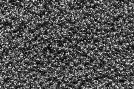 Background of steel wires twisted into spirals in the form of prisms. Spiral-prismatic nozzle. Abstract metal background for design.の写真素材