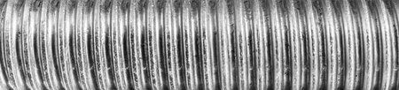 Texture of metal bolt thread. Abstract banner for design.の写真素材