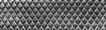 Metal texture with diamond pattern. Abstract background of steel for design. Banner.の写真素材