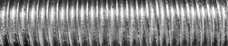 Texture of metal bolt thread. Abstract banner for design.の写真素材