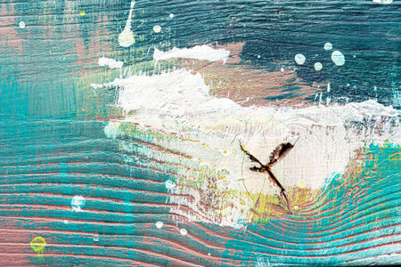 Colorful painted textured wooden plank with a paint stains. Abstract background for design.の写真素材