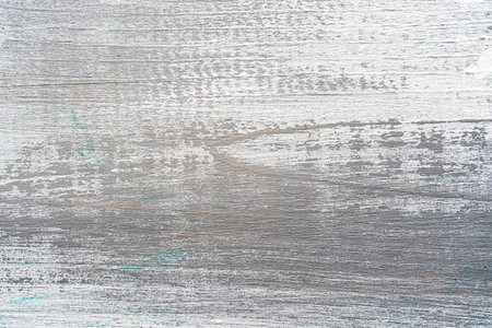 White and gray painted textured wooden plank. Abstract background for design.の写真素材