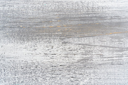 White and gray painted textured wooden plank. Abstract background for design.の写真素材