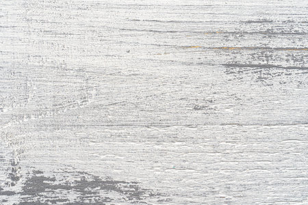 White and gray painted textured wooden plank. Abstract background for design.の写真素材