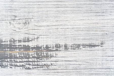 White and gray painted textured wooden plank. Abstract background for design.の写真素材