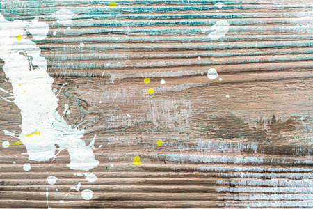 Colorful painted textured wooden plank with a paint stains. Abstract background for design.の写真素材