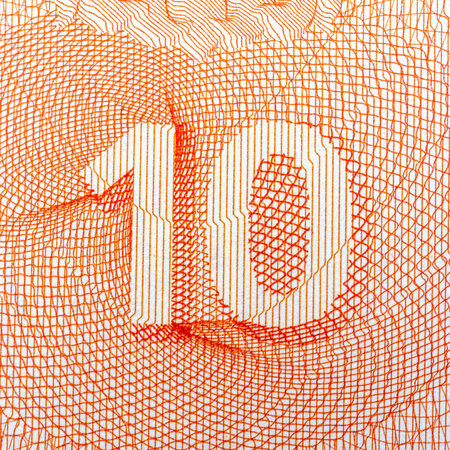 Abstract pattern with orange number 10, detailed geometric lines, white background. Concept of currency security or design.の写真素材