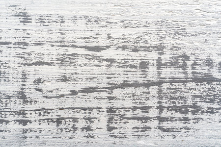 White and gray painted textured wooden plank. Abstract background for design.の写真素材