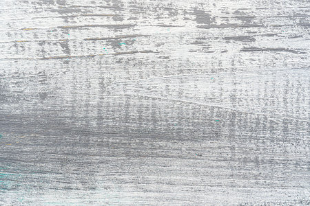 White and gray painted textured wooden plank. Abstract background for design.の写真素材