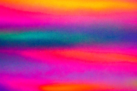 A fragment of colorful art painted on a wall. Abstract urban background for design. Spray painting.の写真素材