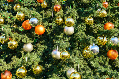 Christmas toys and balls on an artificial spruce. Xmas abstract background.の写真素材