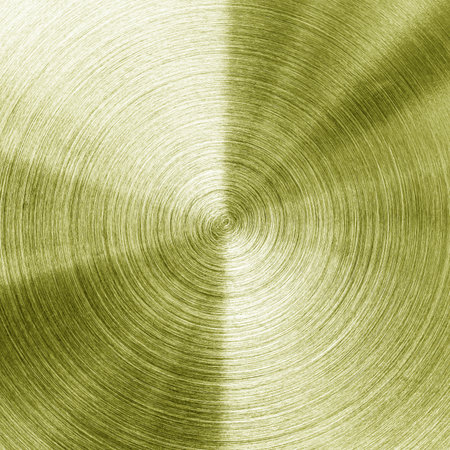 Golden circular brushed shiny metal texture. Abstract metallic background for design. Circle shape.の写真素材