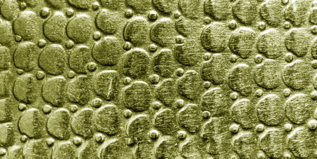 Scratched bronze texture with round pattern. Abstract metallic background for design. Banner.の写真素材