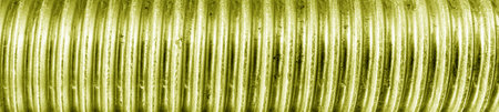 Texture of golden bolt thread. Abstract metallic banner for design.の写真素材