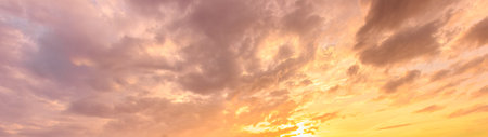 Abstract sunset clouds background for motivational inspiration, serenity mind, relaxation, hope message. Nature meditation backdrop with yellow color and soft mood. Banner.の写真素材