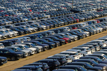 Russia, Kaluga, AGR Automotive Group - July 7, 2025: Rows of new cars parked close together in a...
