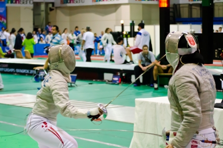 BANGKOK - MARCH 10: Unidentified Fencing Athletic fight against of Asian Junior & Cadet Fencing...