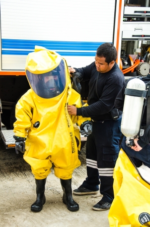 SINGBURI - JUNE 13 : Practicing fire protection plan and chemicals prepare for the officer about the Disaster Management on June 13, 2013 in Singburi, Thailand.のeditorial素材