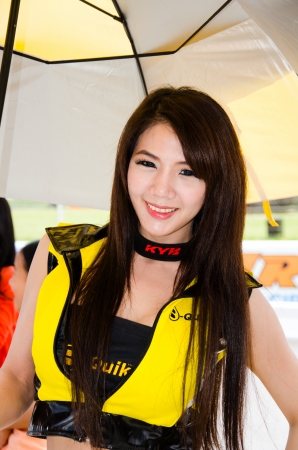 CHOUN BURI - AUGUST 18  Unidentified model with racing car on display at the Thailand Super Series 2013 Race 4 on August 18, 2013 at the Bira International Circuit Pattaya, Thailand のeditorial素材