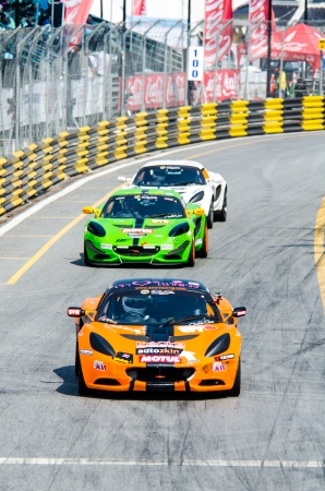 CHON BURI - DECEMBER 22: Unidentified racer with Lotus car on display at the Bangsaen Thailand Speed Festival 2013 Race 8 on December 22, 2013 at the Bangsaen street circuit , Thailand.のeditorial素材