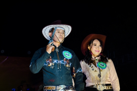 SINGBURI - DECEMBER 30   Unidentified model portrait on display Cowboy Night contest of cowboy festival December 30, 2013 in Singburi, Thailand のeditorial素材