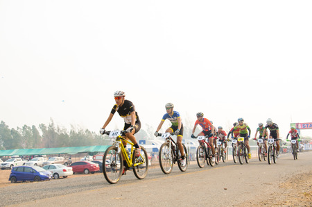 CHAINAT, THAILAND - MARCH 8   Unidentified biker riding a mountain bike at Thailand Championship 2014 Race 3 on March 8, 2014 in Chainat, Thailand のeditorial素材