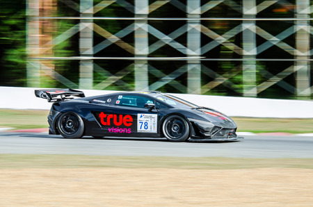CHOUN BURI - JULY 5  Suthilak B  with Lamborghini Gallardo LP600 GT3 on display at the Thailand Super Series 2014 Race 3 on July 5, 2014 at  the Bira International Circuit Pattaya, Chon Buri Thailand のeditorial素材