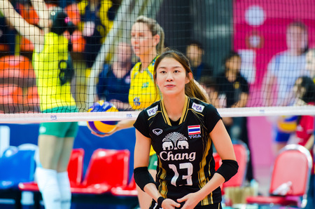 BANGKOK - AUGUST 17: Nootsara Tomkom of Thailand Volleyball Team in action during The Volleyball World Grand Prix 2014 at Indoor Stadium Huamark on August 17, 2014 in Bangkok, Thailand.のeditorial素材