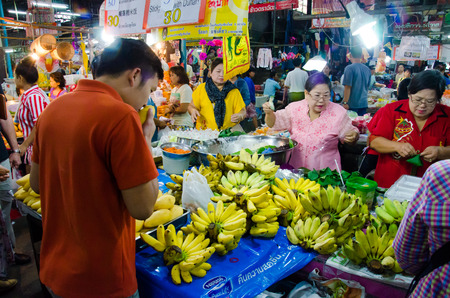 CHIANG MAI -THAILAND OCTOBER 19: People are buying the commercial at ChangPuak Gate Market on October 19, 2014 in Chiang Mai,Thailand.のeditorial素材