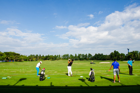 CHONBURI - DECEMBER 13 : Player was golf driving before the match in Thailand Golf Championship 2014 at Amata Spring Country Club on December 13, 2014 in Chonburi, Thailand.のeditorial素材